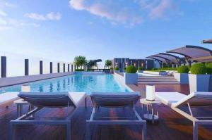 a rendering of a swimming pool on a building at CSJ Tower Seaview Apartment -Luxury Near Back Beach Vung Tau City in Vung Tau