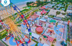an aerial view of an amusement park with a roller coaster at CASA Villa NOVAWORLD Phan Thiet in Phan Thiet