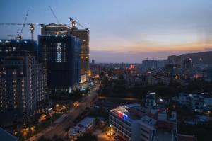 a view of a city at night at CSJ Tower Seaview Apartment -Luxury Near Back Beach Vung Tau City in Vung Tau