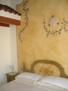Postel nebo postele na pokoji v ubytování B&B I fiori di Marianna