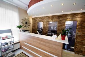 Лоби или рецепция в C&S Hotel