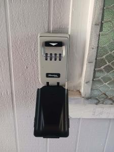a soap dispenser is attached to a wall at Mana ki he Mana Residence in Pelehake, Tongatapu in Malapo