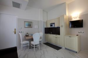 Kuchyň nebo kuchyňský kout v ubytování Hotel Residence Villa Del Mare