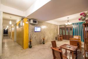 TV a/nebo společenská místnost v ubytování รีสอร์ทที่ลำปาง (Resort At Lampang)