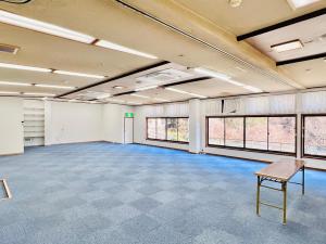 a large room with white walls and windows at 神庭-kaniwa- in Chichibu