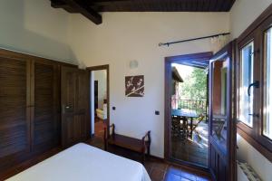 A bed or beds in a room at Apartamentos Casasturga