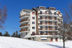Résidence Néméa Les Balcons d'Ax v zimě