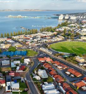 an aerial view of a city with the ocean at The Laneway - 3BR, Pet Friendly, Walk to CBD in Port Lincoln