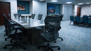 a conference room with a long table and chairs at Hampton Inn and Suites Houston-Katy in Katy +40 photos