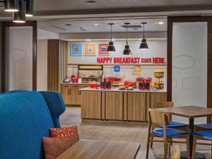 a mcdonalds restaurant with a happy breakfast counter at Hampton Inn Pigeon Forge in Pigeon Forge
