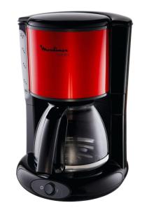 a red coffee pot on top of a coffee maker at Calm Nest Apartment in Flic-en-Flac