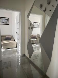 a view of a living room with a stairway at Apartamenty AP 11 in Częstochowa