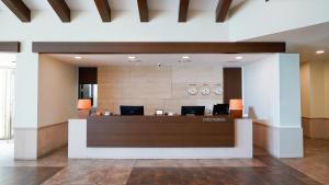 a lobby of a hotel with a reception desk at Sagewood Yeosu Gyeongdo Resort in Kyŏngho-dong +41 photos