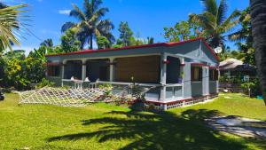 a house with a net in the yard at Villa Ste Marie in Sainte Marie
