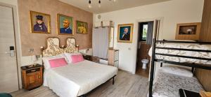 a bedroom with a bed and a bunk bed at Art Gallery Rooms in Lonato +58 photos