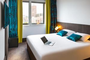 Postel nebo postele na pokoji v ubytování Ibis Styles Lyon Centre - Gare Part Dieu