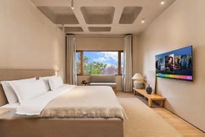 TV tai viihdekeskus majoituspaikassa Kunming Latosol hotel