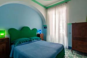 Postel nebo postele na pokoji v ubytování Casa Astarita