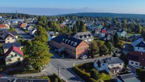 an aerial view of a small town with a building at Der Bayerische Hof in Grünbach