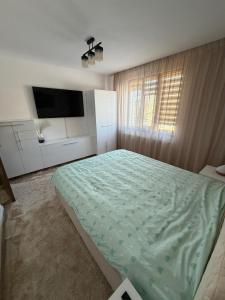 TV a/nebo společenská místnost v ubytování Apartament modern central