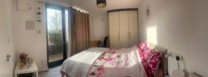 a bedroom with a bed and a window at Cozy Room , prime location in Dublin