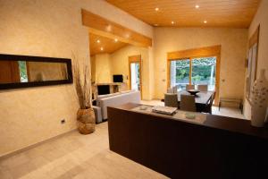 a large living room with a couch and a table at Spacious Countryside Costa Brava Relax in Sils
