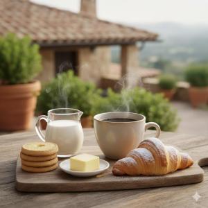 a table with a cup of coffee and croissants and a cup of milk at Villa Topaz iun T4815 in Capoterra