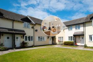 a house with a large mirror on the front of it at 2 Bed in Instow oc-stones in Instow