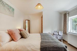 a bedroom with a bed with pillows on it at 2 Bed in Neenton oc-s29533 in Neenton