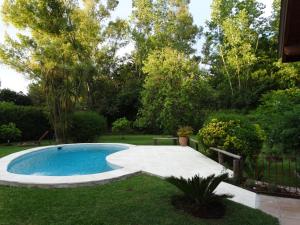 Swimming pool sa o malapit sa La Rosa de los Vientos km54