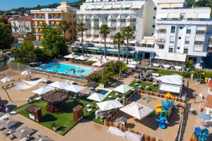 an aerial view of a resort with a pool at Abruzzo Marina Hotel - Family & Beach Resort in Silvi Marina