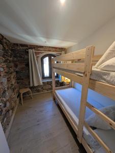Llit o llits en una habitació de Ca la Ru