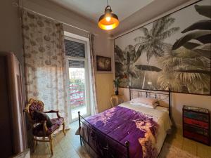 a bedroom with a bed and a window at Hotel Continental Cassino in Cassino