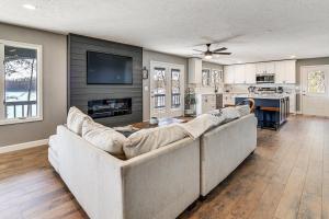 a living room with two couches and a tv at Waterfront Deck, Shell Knob Gem on Table Rock! in Shell Knob