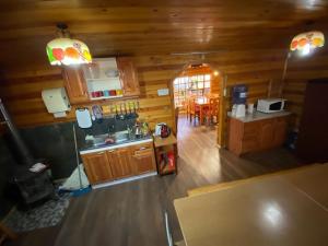 an aerial view of a kitchen in a log cabin at Chiloe Seta in Ancud