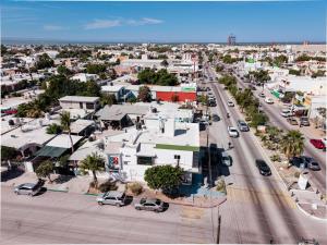 an aerial view of a city with cars on a street at Departamento Palmito in La Paz