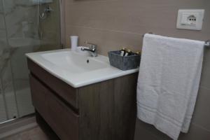 a bathroom with a sink and a shower at Al Giardino b&b in Acri +18 photos
