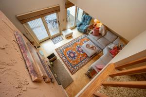 an overhead view of a living room with a couch at DC Love Shack by Railey Vacations in McHenry