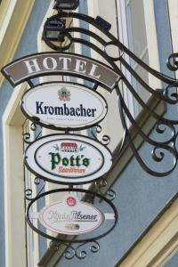 a sign on the side of a building at Mühlenkamp Hotel & Gastronomie in Oelde