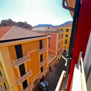 a view from a balcony of colourful buildings at R&V Apartments - Nel cuore di La Spezia in La Spezia
