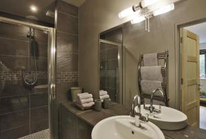 a bathroom with two sinks and a shower at 6 Bed in Lavenham oc-stofa in Lavenham +34 photos