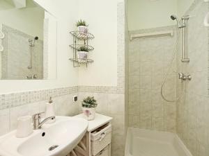 Ένα μπάνιο στο Apartament Kameralny 12