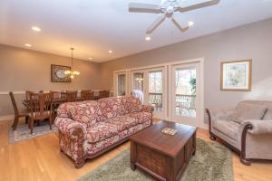 a living room with a couch and a table at Restful Retreat by Railey Vacations in Oakland +43 photos