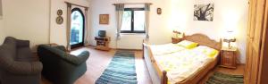 Ένα δωμάτιο στο Ferienhof Halmersberg