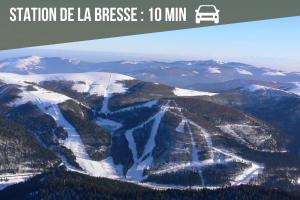 an aerial view of a mountain with snow at La Ferme des 3 lacs in Xonrupt-Longemer