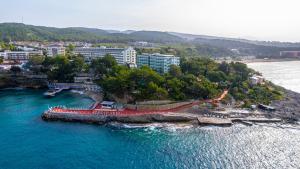 an aerial view of a resort on the water at İncekum West Hotel -Ultra All Inclusive in Alanya