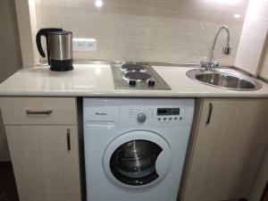 Η κουζίνα ή μικρή κουζίνα στο Apartment Paronyan 22