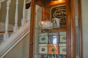 a glass display window of a coffee shop at The Allen House in Ridgefield