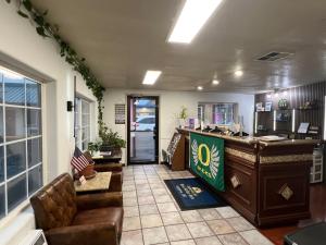 an office with a desk and a lobby at Americas Best Value Inn Eugene in Eugene