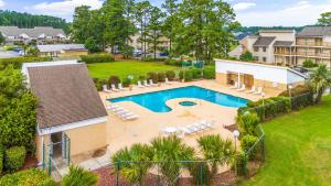 an aerial view of a swimming pool in a yard at Baytree 28G in Little River